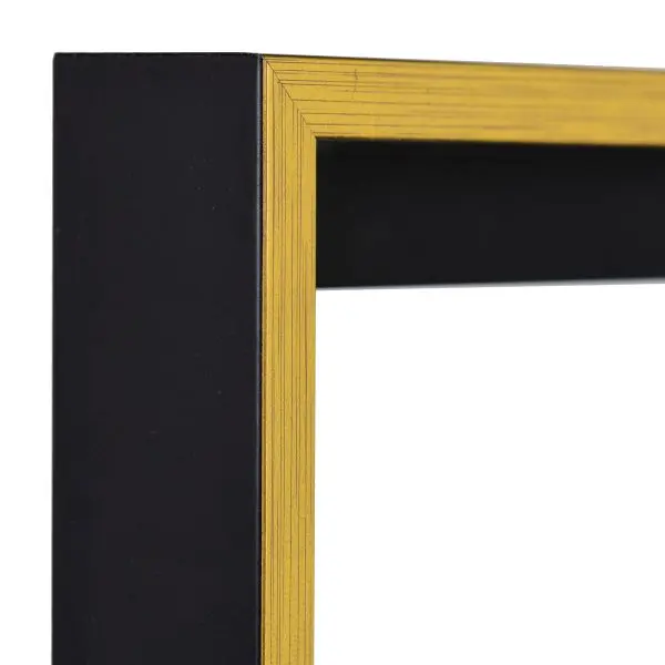 Vista de la esquina de un marco de sombra flotante moderno y discreto en negro con borde dorado