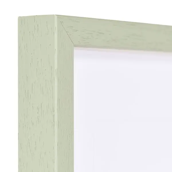 Vista de la esquina de un marco moderno verde para pósteres