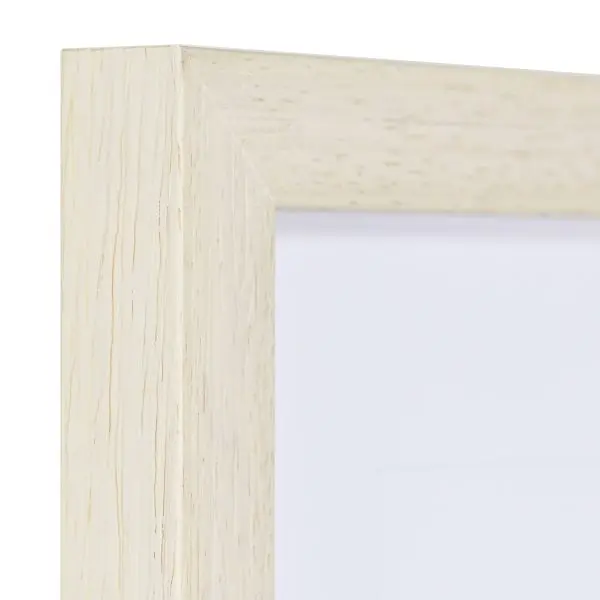 Vista de la esquina de un marco de madera cuadrado, moderno y blanco, con su estructura de madera visible