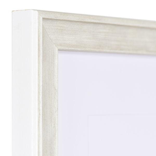Vista de la esquina de un marco de madera elegante y blanco